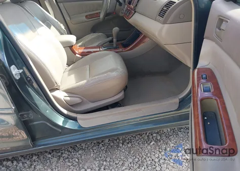 2002 Toyota Camry Le z USA, uszkodzony, nr VIN 4T1BE32K12U517129